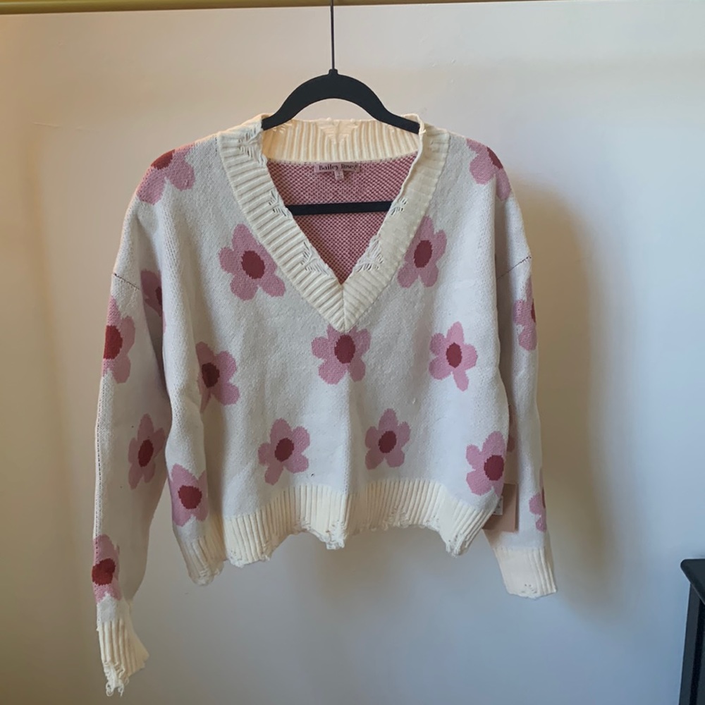 Bailey Rose Alterd State flower sweater with distressed neckline and hem